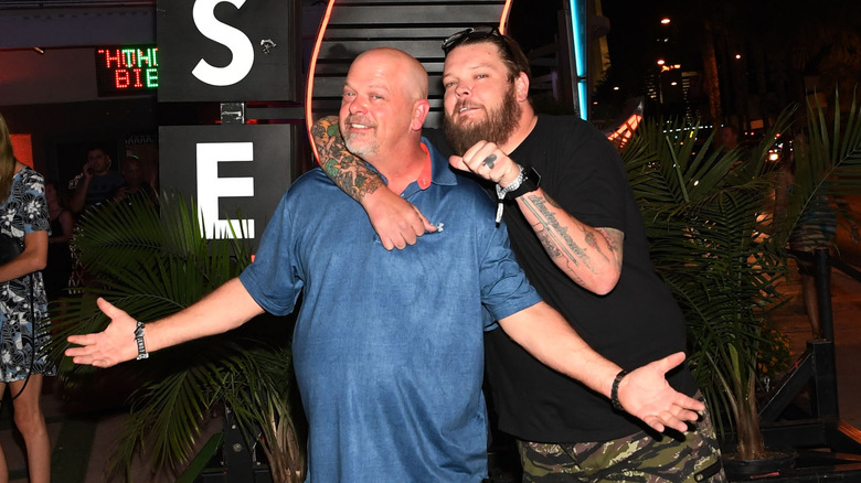 Corey Harrison hugging Rick Harrison