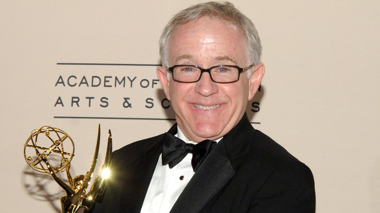 Leslie Jordan holding Emmy Award