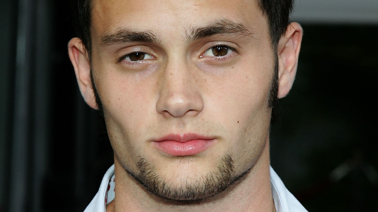 Penn Badgley with a goatee