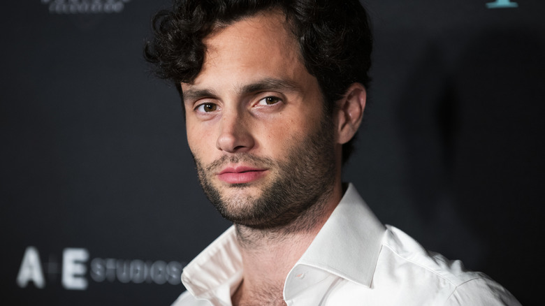 Penn Badgley wearing a white shirt