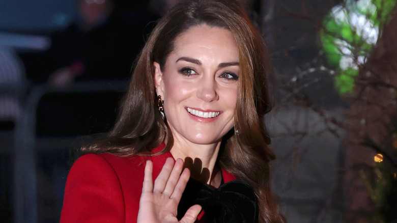 Kate Middleton waving and smiling at the Together at Christmas Carol Service 2024