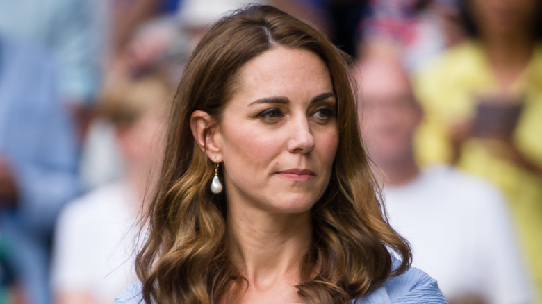 Kate Middleton looking to the side at the 2019 Wimbledon tournament