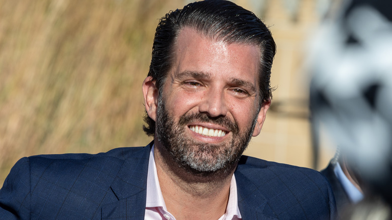 Donald Trump Jr. grinning