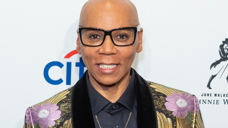 RuPaul smiling out of drag