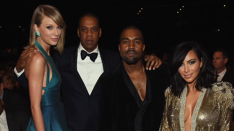 Taylor Swift, Jay-Z, Kanye West, and Kim Kardashian pose