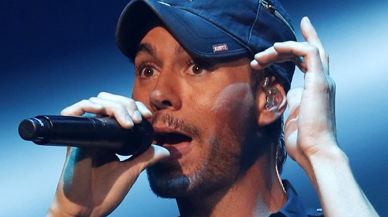 Enrique Iglesias holding microphone