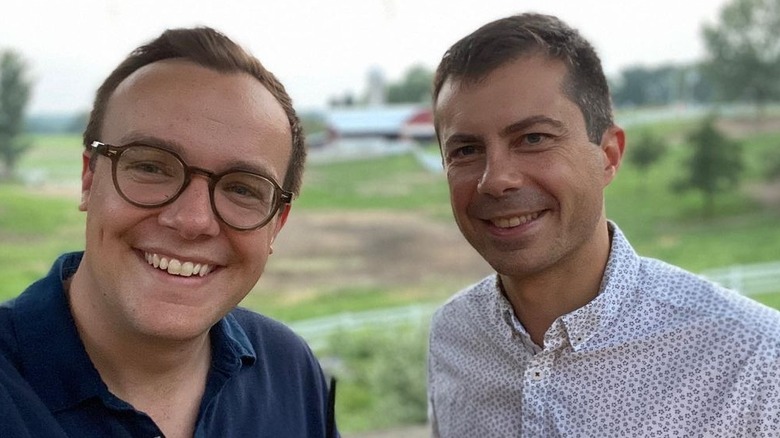 Chasten Buttigieg and Pete Buttigieg outdoors