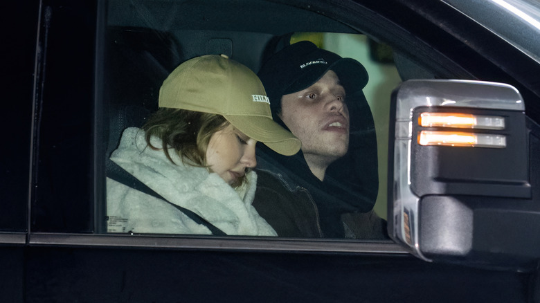 Pete Davidson and Madelyn Cline in a car