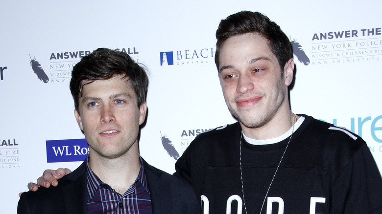 Pete Davidson and Colin Jost posing for a picture