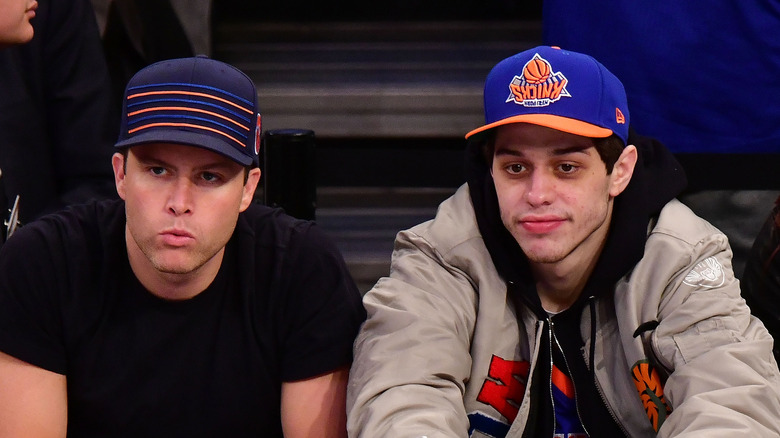 Colin Jost and Pete Davidson courtside