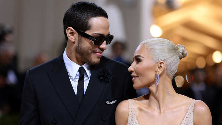 Pete Davidson with Kim Kardashian smiling 