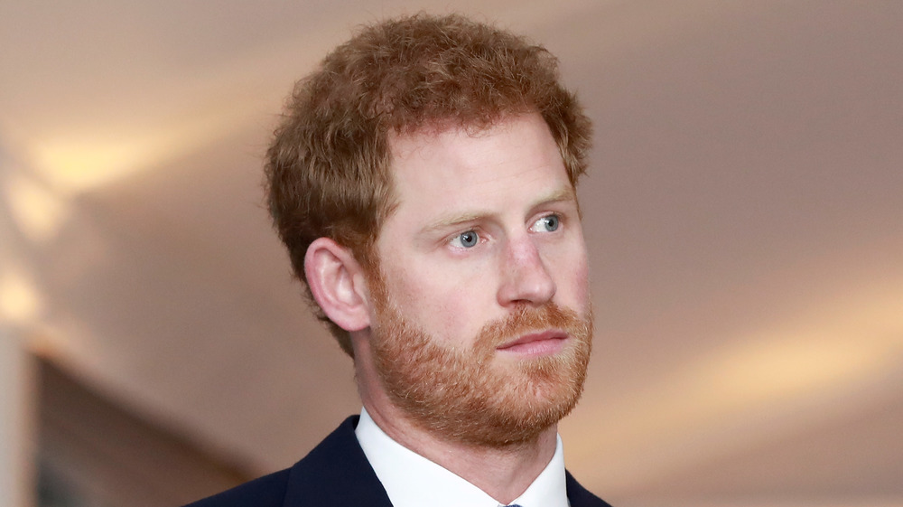 Prince Harry with a serious expression