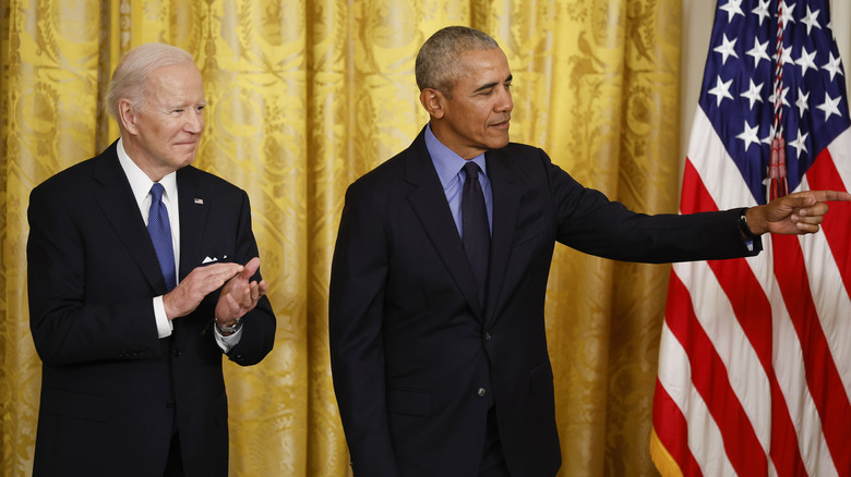 Joe Biden and Barack Obama standing