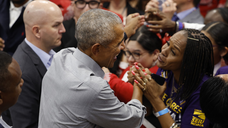 Barack Obama greeting a fan