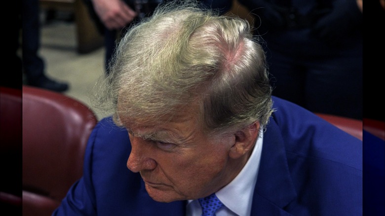 Donald Trump ducking head