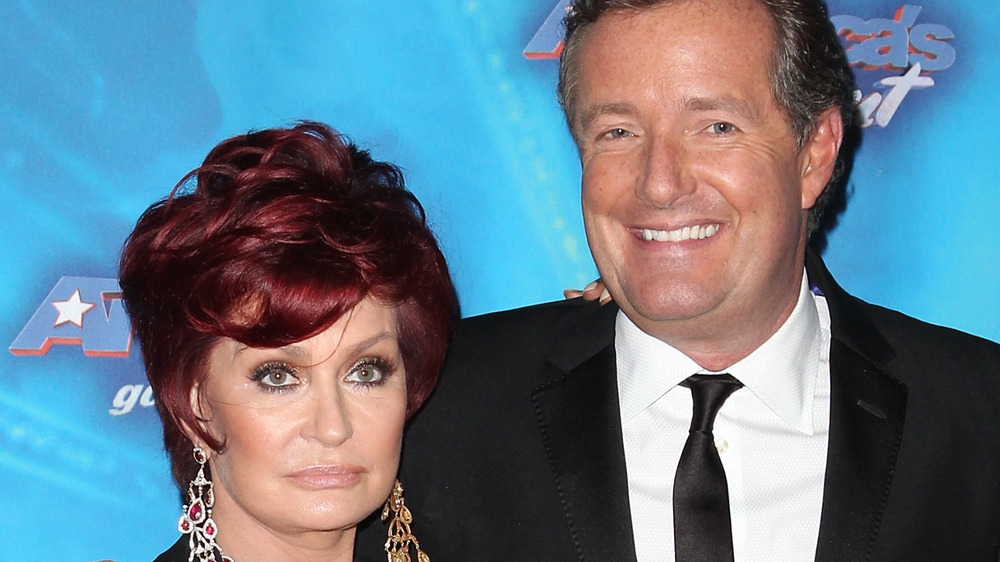 Sharon Osbourne and Piers Morgan pose together in 2011