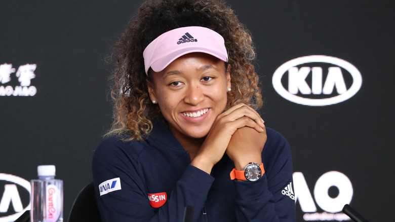 Naomi Osaka speaking at a press conference