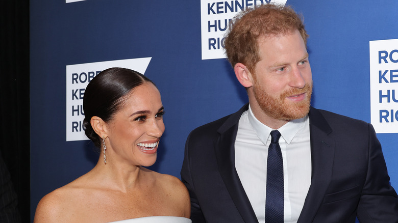 Meghan Markle and Prince Harry smile 