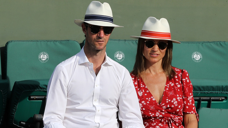 Pippa Middleton and James Mathews wearing hats