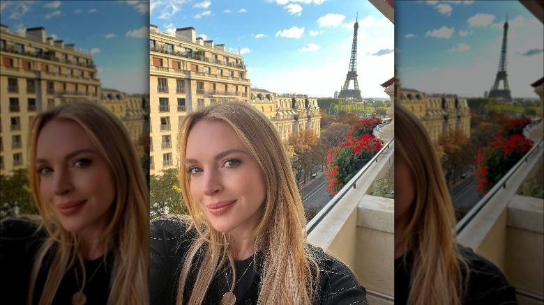 Lindsay Lohan with Eiffel Tower in the background