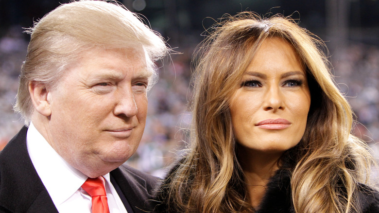 Donald Trump posing with Melania Trump