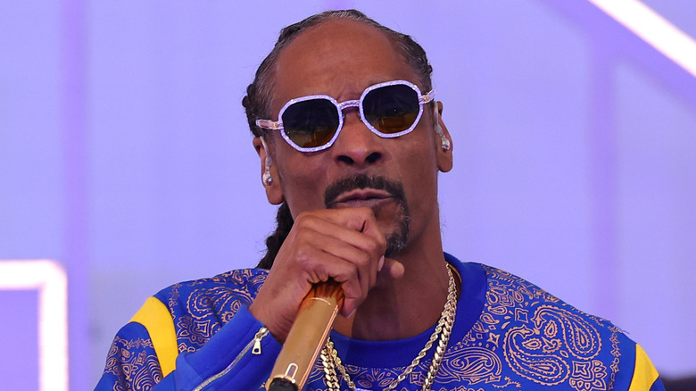 Snoop Dogg holding microphone