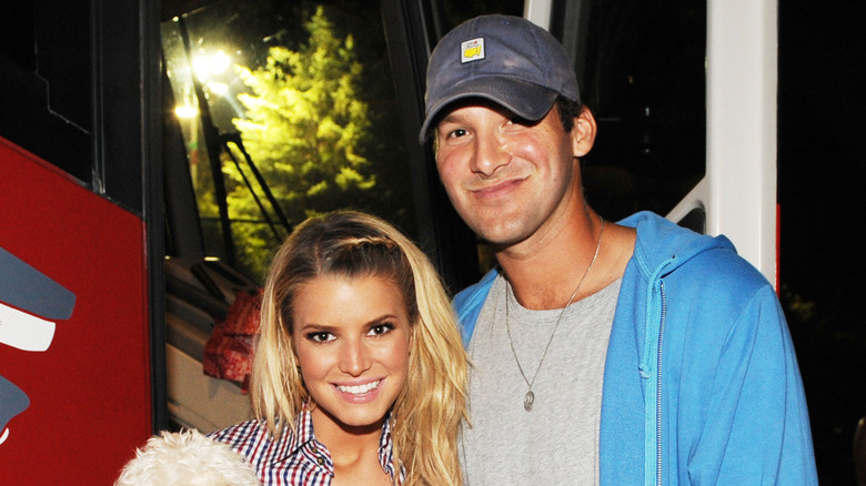 Jessica Simpson and Tony Romo smiling