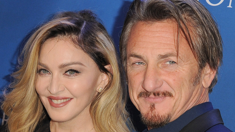 Madonna and Sean Penn cuddled close