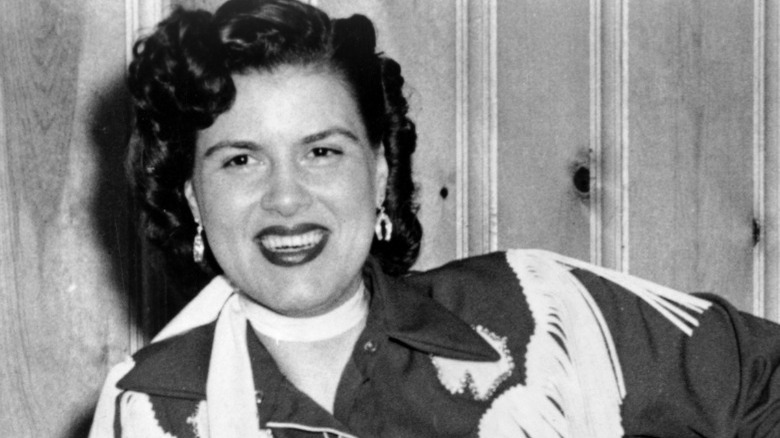 Patsy Cline smiling, red lipstick