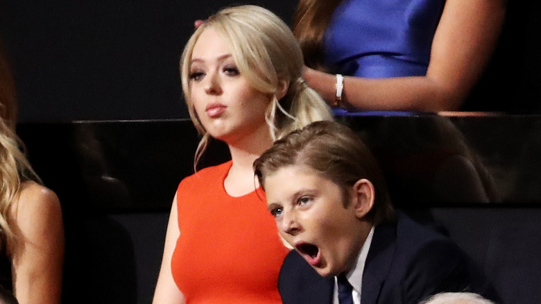 Barron Trump yawning and sitting with Tiffany Trump