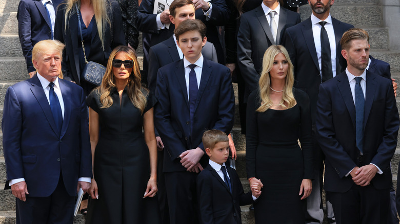 The Trump family posing on steps