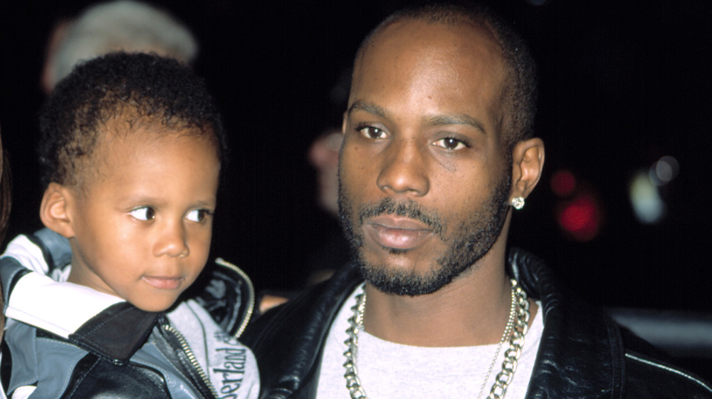 DMX carrying his son