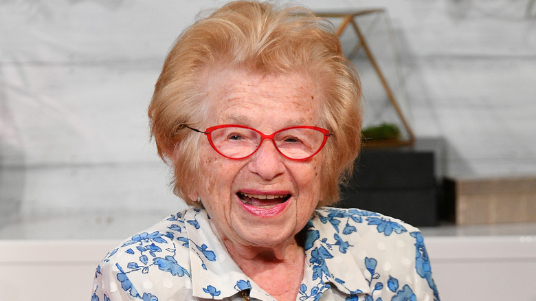 Dr. Ruth wearing red glasses