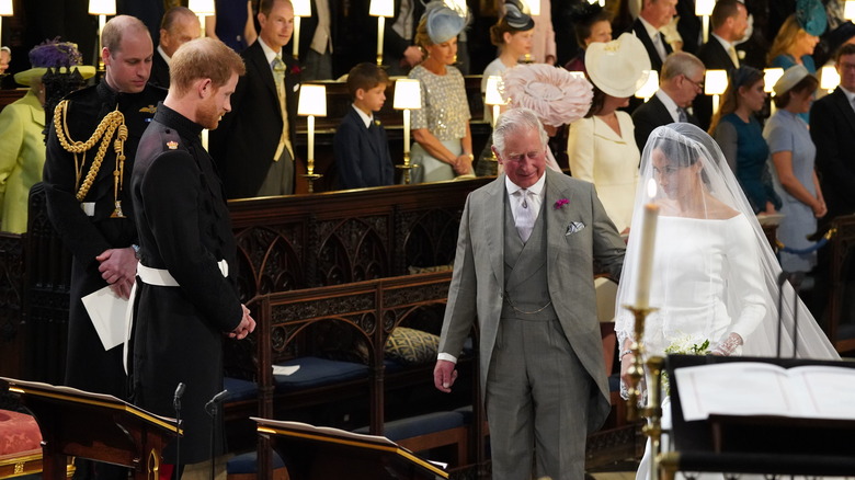 Prince Charles walking Meghan Markle down the aisle