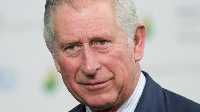 Prince Charles looking away