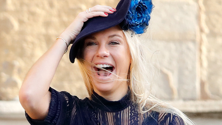 Chelsy Davy attends a royal wedding