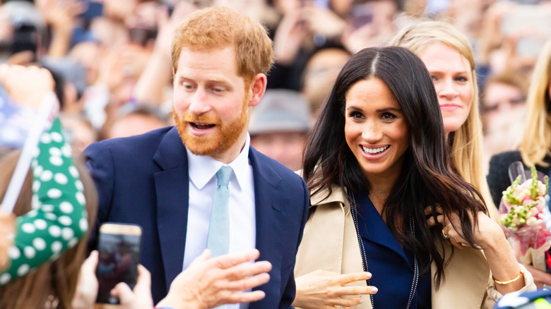 Prince Harry and Meghan Markle meet fans in Australia