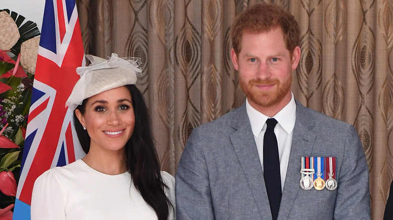 Meghan Markle, Prince Harry posing