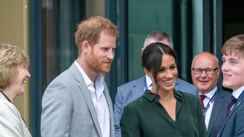 Prince Harry and Meghan Markle in a crowd