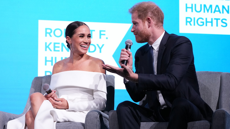 Meghan Markle and Prince Harry speaking