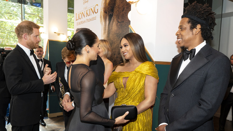 Meghan Markle chatting with Beyonce