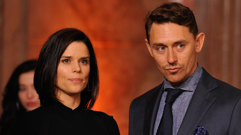 Neve Campbell, JJ Feild posing