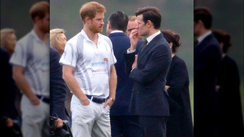 Prince Harry talking to Matt Smith