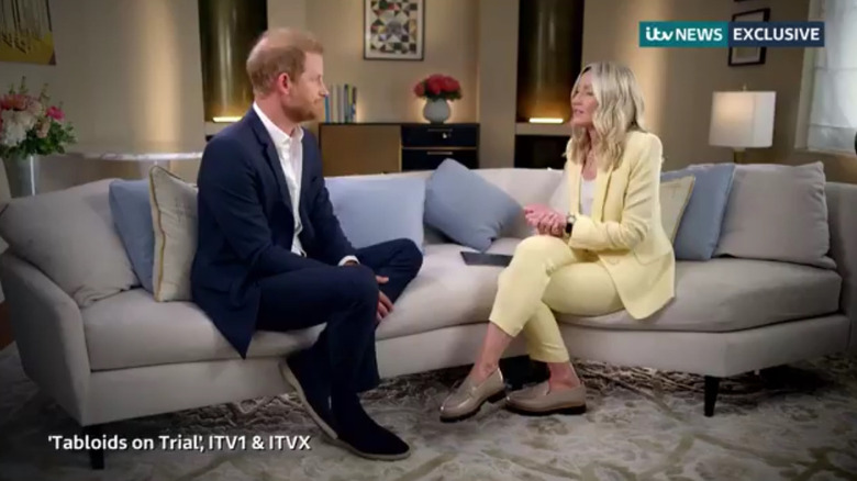 Prince Harry being interviewed on a couch