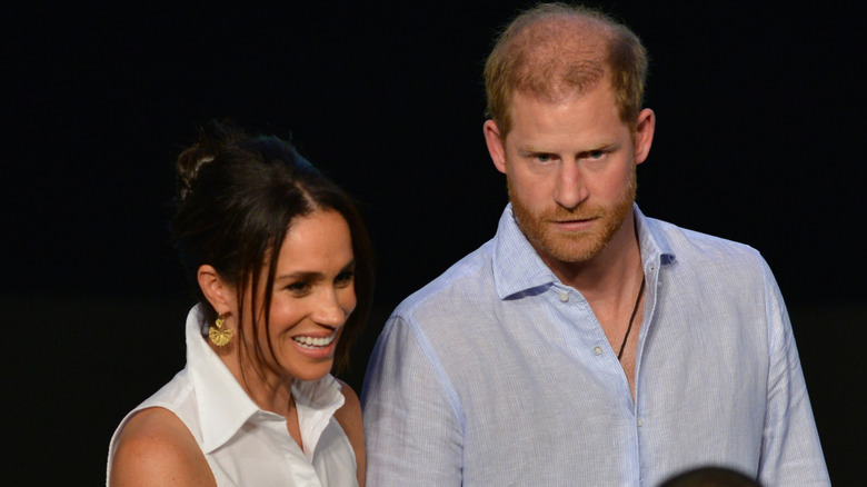 Meghan Markle and Prince Harry on stage at a summit in Colombia.