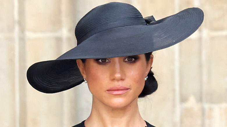 Meghan Markle in black hat 