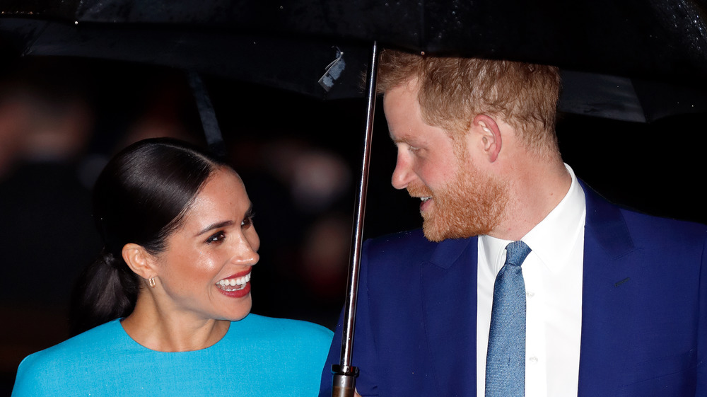 Prince Harry and Megan Markle smiling