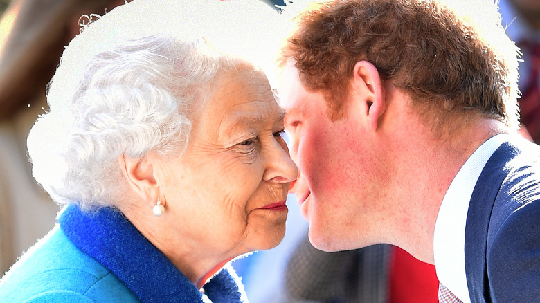 Prince Harry talking to Queen Elizabeth