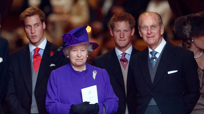 Prince Harry with Queen Elizabeth, Prince William and Prince Philip