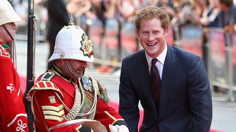 Prince Harry smiles at the Zulu screening